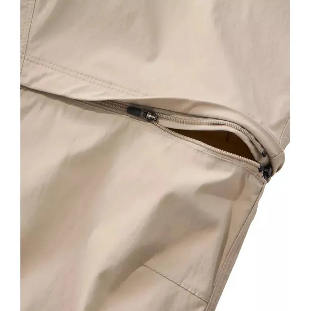 Side view of the L.L.Bean Women's Tropicwear Zip-Off Pants, Mid-Rise in Soft Sand showing the zipper detail.