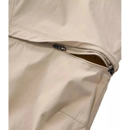 Side view of the L.L.Bean Women's Tropicwear Zip-Off Pants, Mid-Rise in Soft Sand showing the zipper detail.