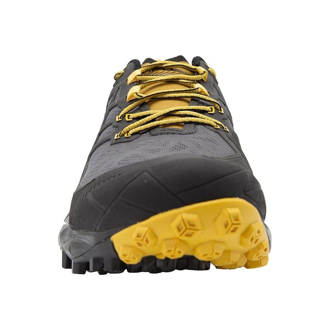 Front view of the La Sportiva Akyra II GTX in Carbon/Bamboo with yellow laces and a yellow lugged outsole against a white background.