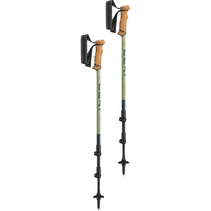Two Leki Legacy Lite trekking poles with tan grips and black straps, shown from a side angle against a white background.
