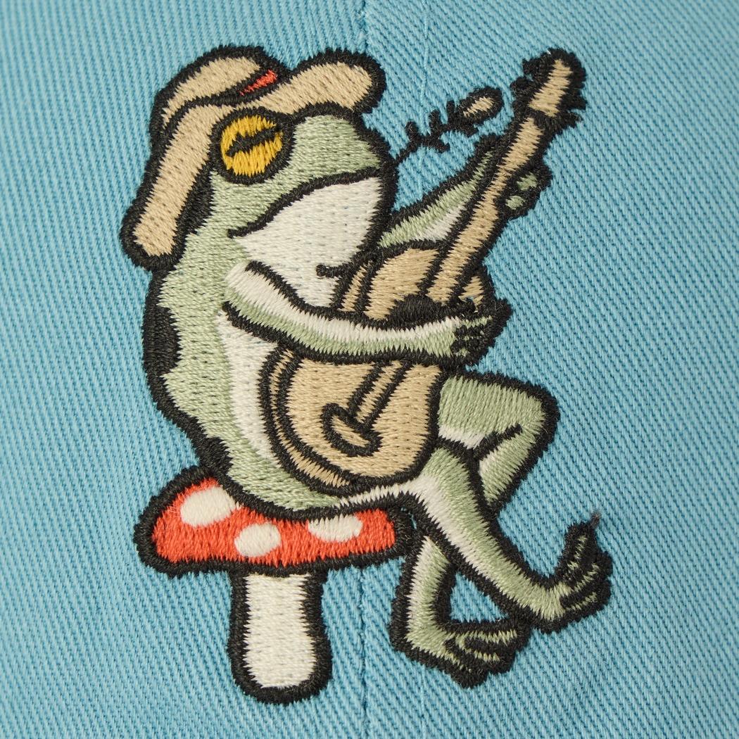 A close-up of the Cool Blue Life is Good Kids Guitar Frog Kids Chill Cap showing the embroidered frog playing guitar on a mushroom.