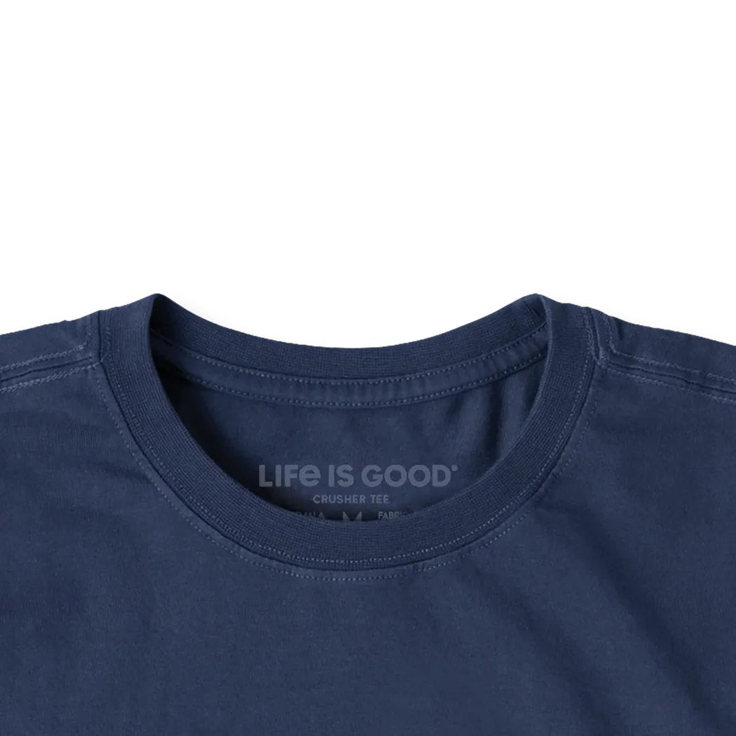 Darkest Blue Life is Good Men's Dad Tax Short Sleeve Tee close up of the collar showing the brand tag against a white background.