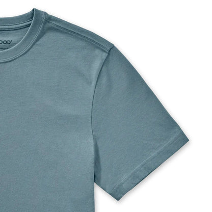 A close-up of the Life is Good Men's Free Hugs Shark Short Sleeve Crusher-LITE Tee in Slate Blue, showing the crew neck and short sleeve against a white background.