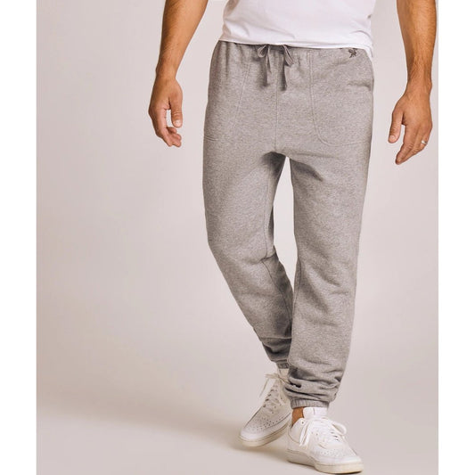 A front view of the Life is Good Men's Solid Good Vibes Jogger in Heather Gray on a model wearing white sneakers against a light background.