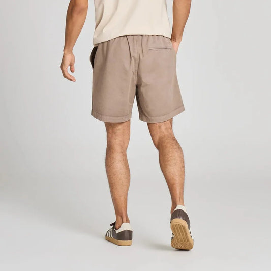 Back view of the Life is Good Men's Solid Weekender Short in Mushroom Brown showing the elastic waistband and pockets against a plain background.