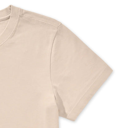 A close-up of the Life is Good Women's Florowl Moon Short Sleeve Crusher Tee in Birch White showing the collar and sleeve seam against a white background.