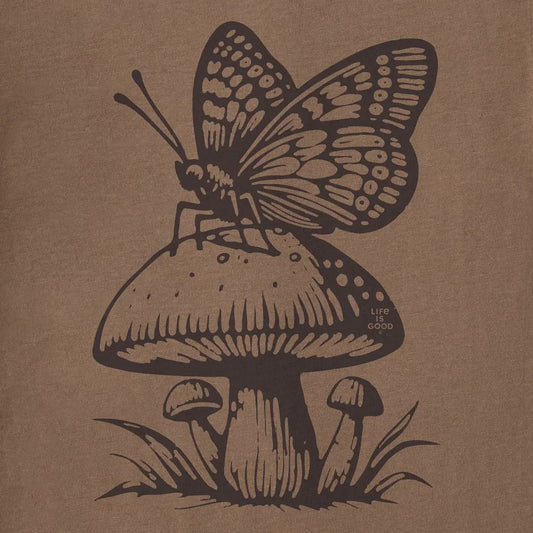 A butterfly sits on a mushroom graphic on the Life is Good Women's Mushy Butterfly Crusher Tee in Mushroom Brown.
