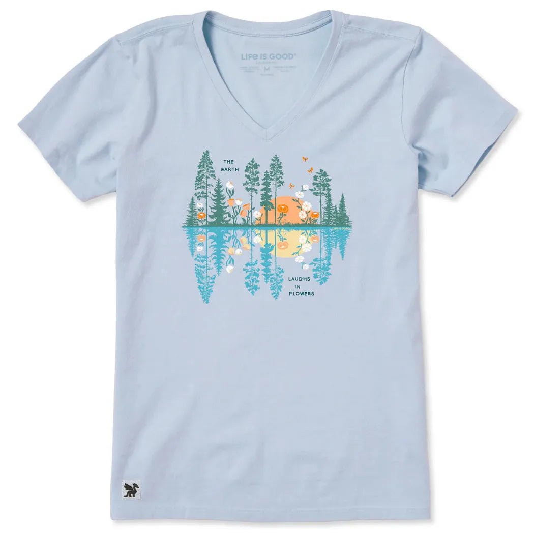A light blue Life is Good Women's Reflections in Bloom Short Sleeve Vee with a nature graphic on the front.