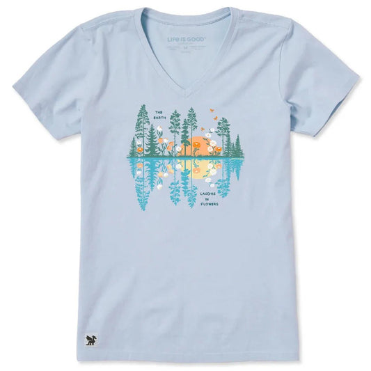 A light blue Life is Good Women's Reflections in Bloom Short Sleeve Vee with a nature graphic on the front.