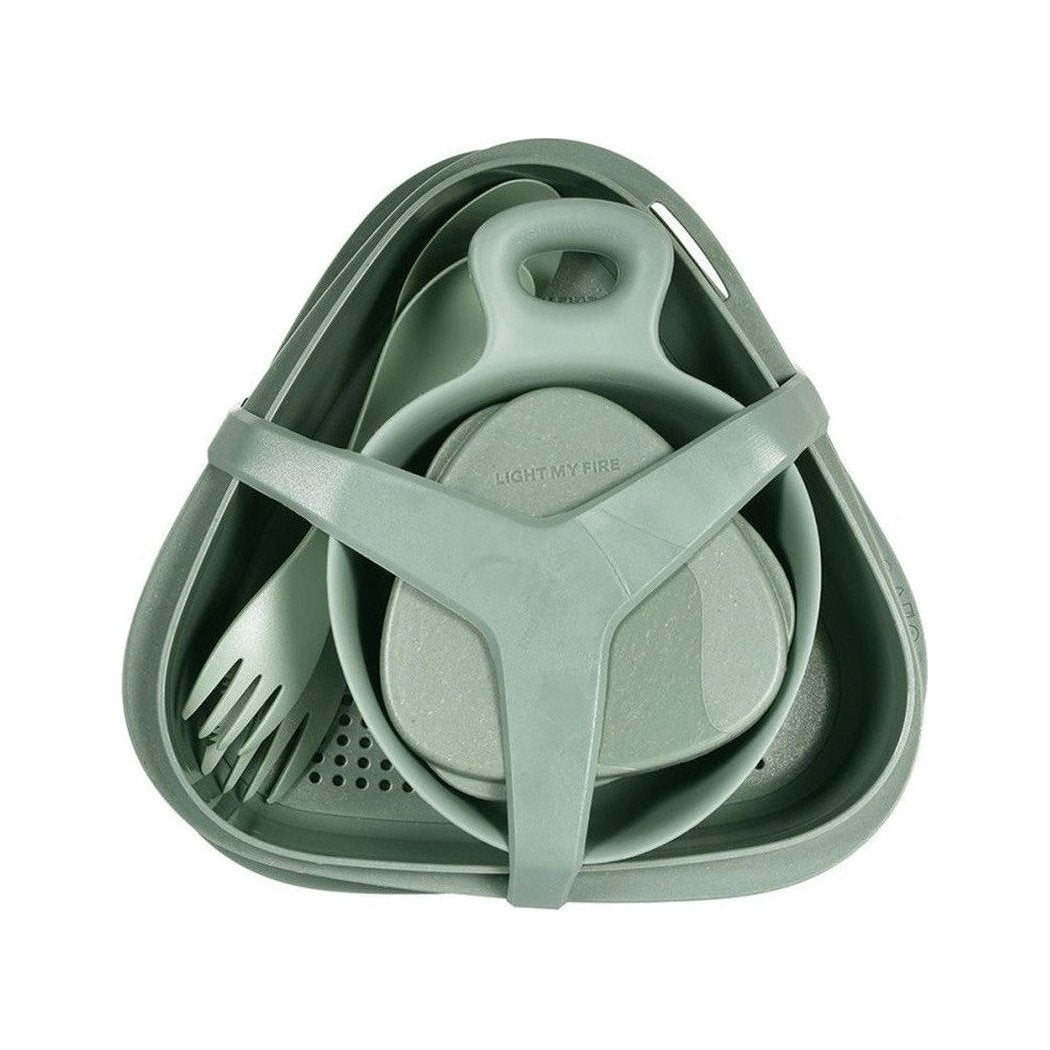 A top-down view of the Hazy Blue Light My Fire Outdoor MealKit BIO showing the compact design and integrated utensils.