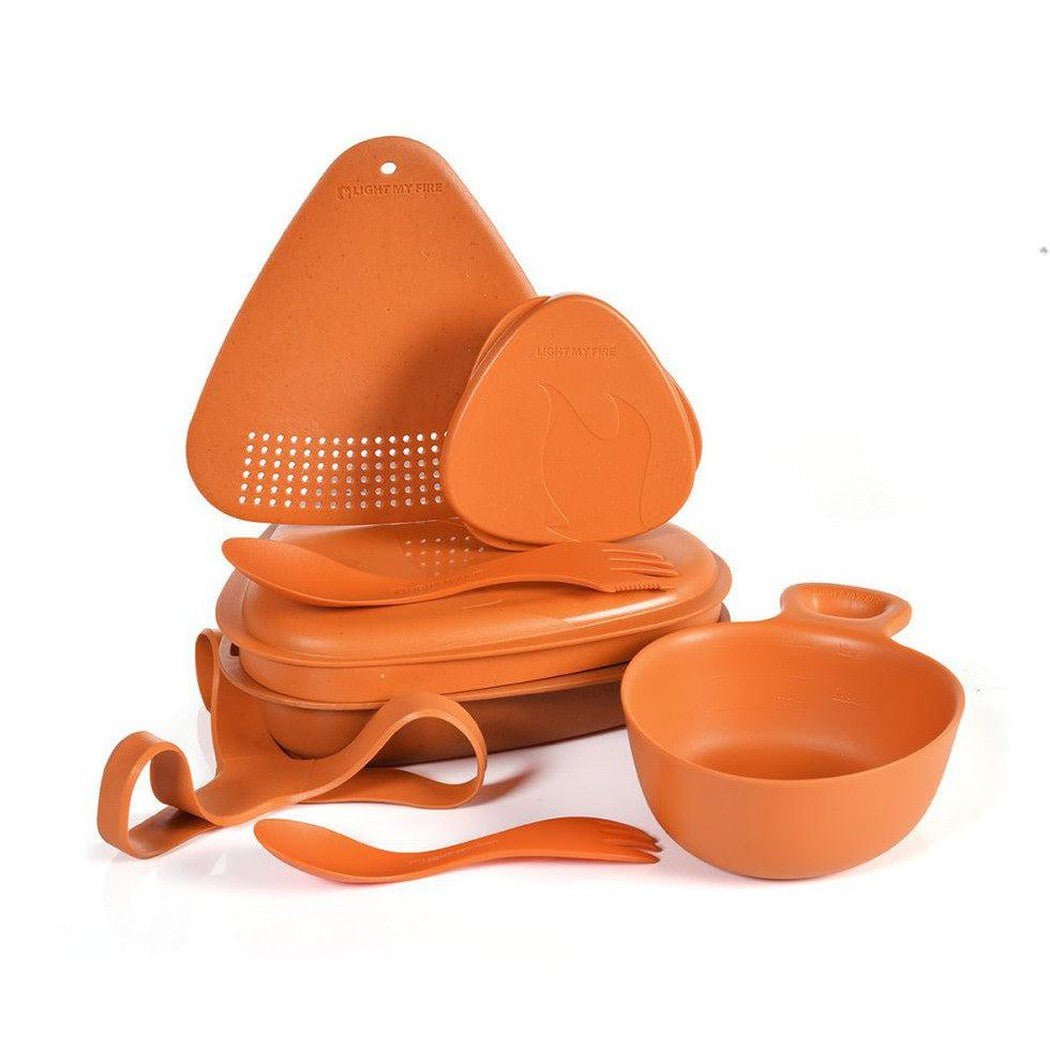 A top-down view of the Light My Fire Outdoor MealKit BIO in Hazy Blue showing the lidded container and bowl against a white background.