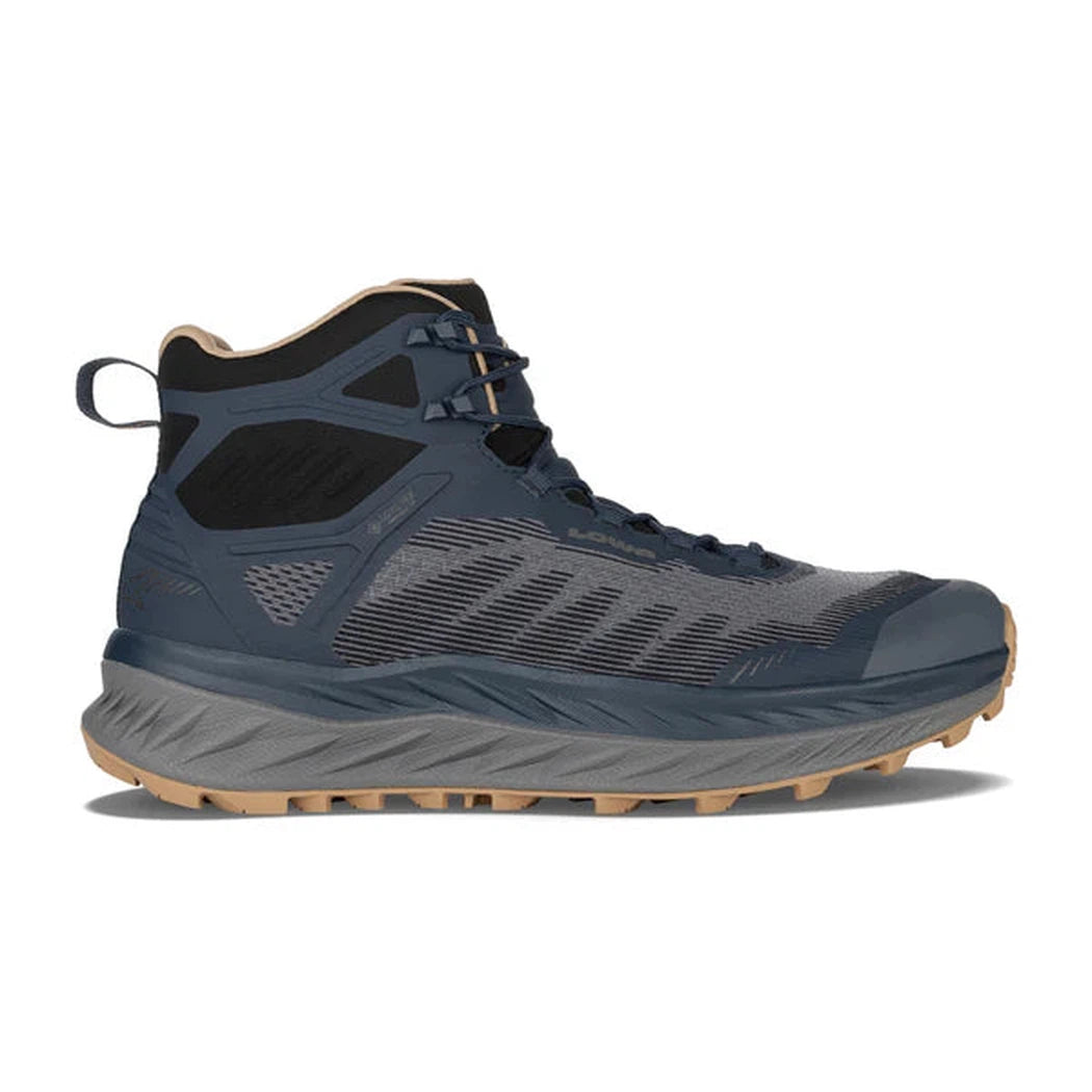 Side view of the Lowa Men's Fortux GTX QC in Navy/Dune showing the lugged outsole against a white background.