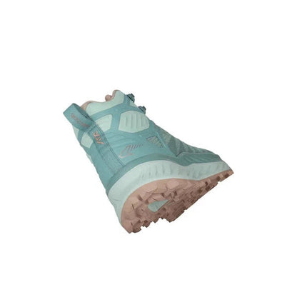Side view of the Lowa Women's Fortux GTX QC in Arctic/Rose showing the lugged outsole against a white background.