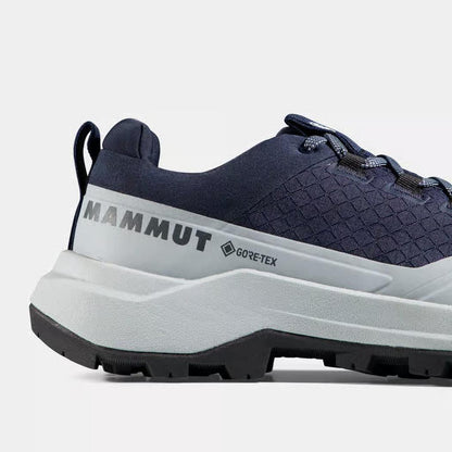Side view of the Mammut Sertig III Low GTX Women in Marine-Platinum showing the GORE-TEX logo and rugged outsole.