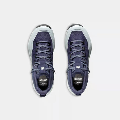 Top view of the Mammut Sertig III Mid GTX Women in AlpineCalaMoonb with laces and tongue branding visible against a white background.