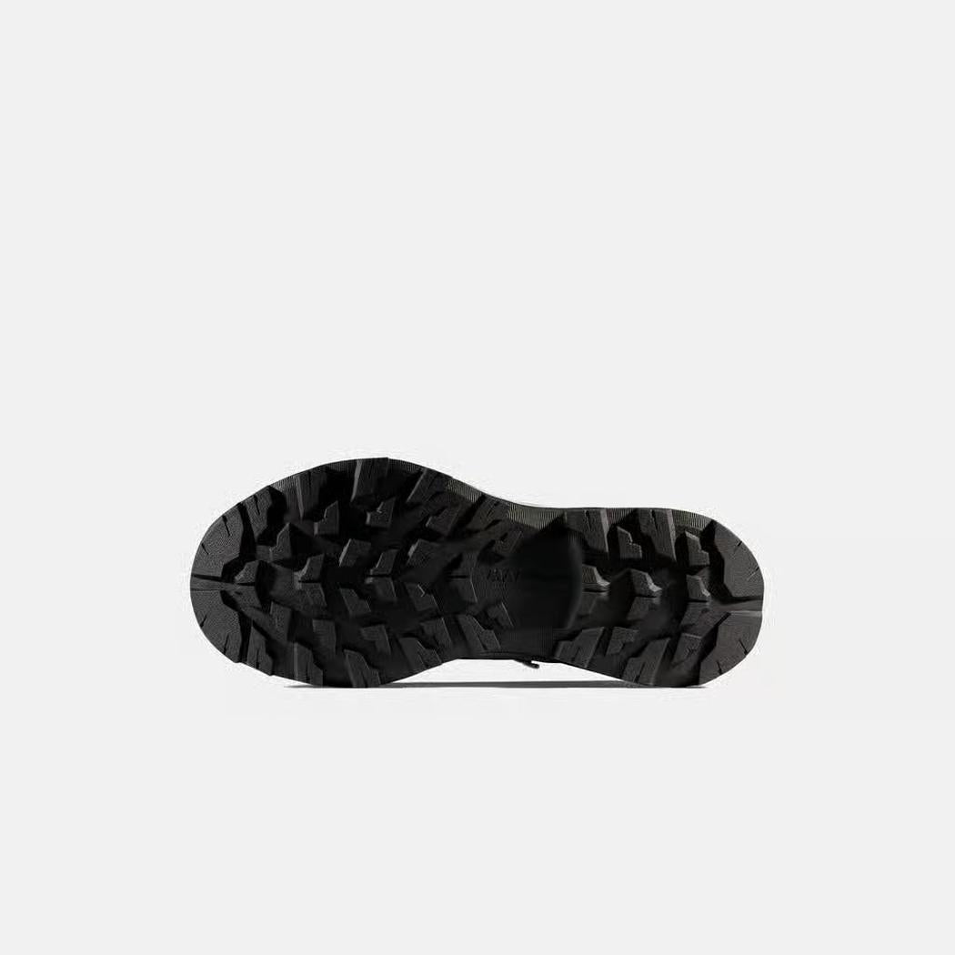 The sole of the Mammut Sertig III Mid GTX Women boot, showing the rugged tread pattern against a plain white background.