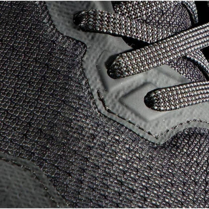 Close-up of the Mammut Sports Group Sertig II Mid GTX Men showing the black fabric upper and laces.