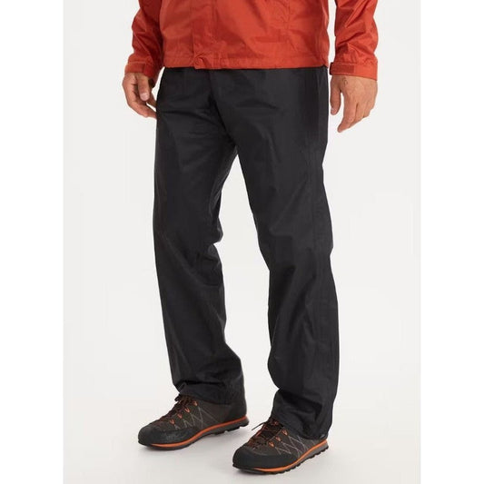 A front view of the Marmot Men's PreCip Eco Full Zip Pant in Black on a model wearing dark hiking shoes against a white background.
