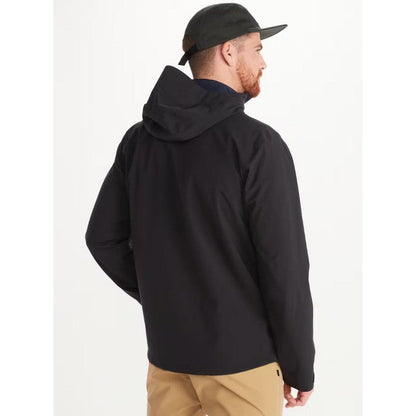 Back view of the Marmot Men's PreCip Eco Pro Jacket in Black on a model wearing khaki pants against a white background.