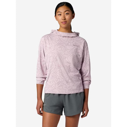 A front view of the Marmot Women's AirExchange SolarShield Hoody in Dust Twirl on a model wearing gray shorts against a white background.