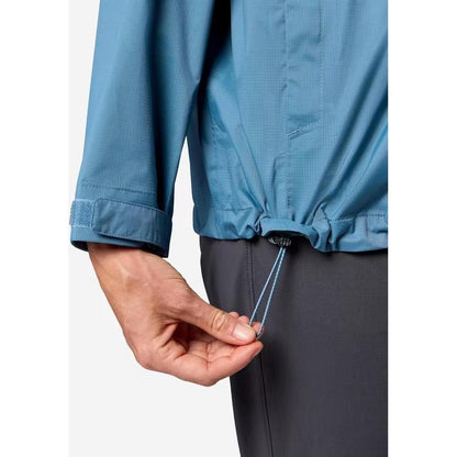 A close-up of the Marmot Women's PreCip Evo Jacket in Summer Storm showing the adjustable hem cord and a model wearing it against a plain background.