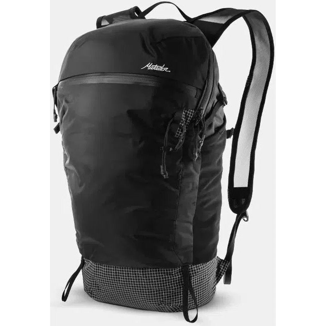A front view of the Matador Freefly 16 Packable Backpack in Black with a checkered bottom panel against a white background.