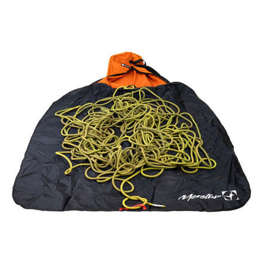 A top-down view of the Metolius Dirt Bag II in Rust showing a coiled yellow rope on a black bag with an orange top.