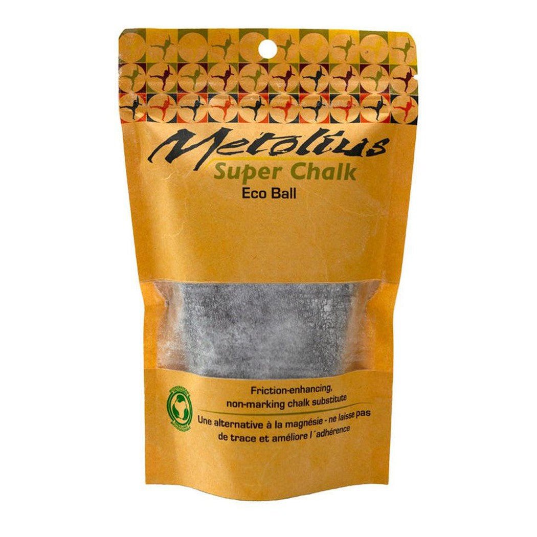 A front view of the Metolius Eco Ball Super Chalk package with a clear window showing the gray chalk inside.