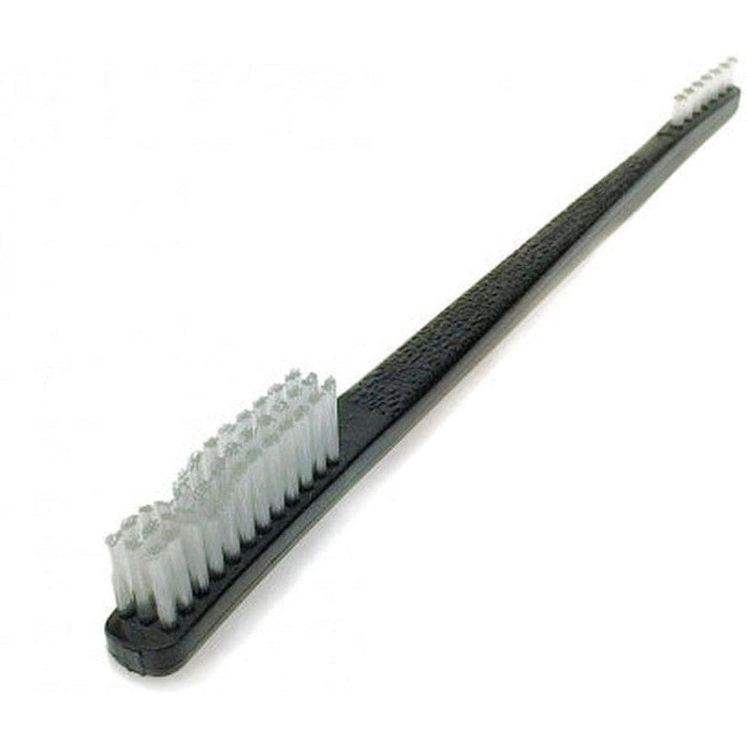 A side view of the Metolius M-16 Bouldering Brush with a black handle and white bristles against a white background.