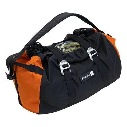 A front view of the Metolius Rope Master HC in Rust showing the top compartment and silver buckles against a white background.