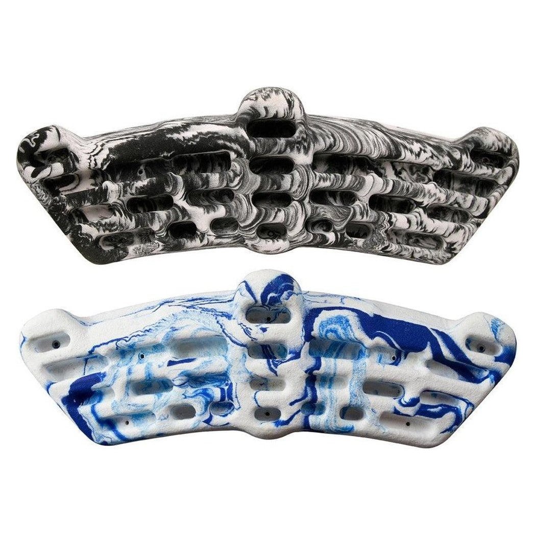 Two Metolius Simulator 3D climbing holds, one in Charcoal/Graphite and one in Blue/White Swirl, are shown from a top-down angle against a white background.