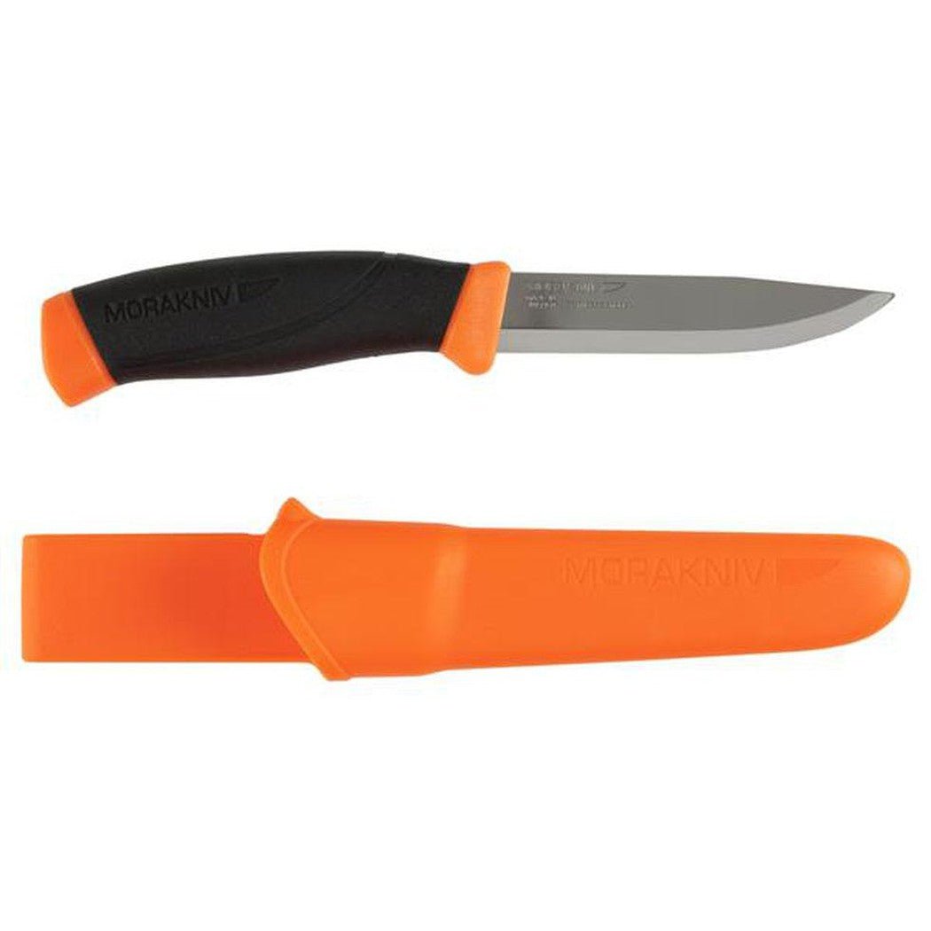 A top-down view of the Morakniv Companion knife with a black handle and orange accents, displayed with its orange sheath.