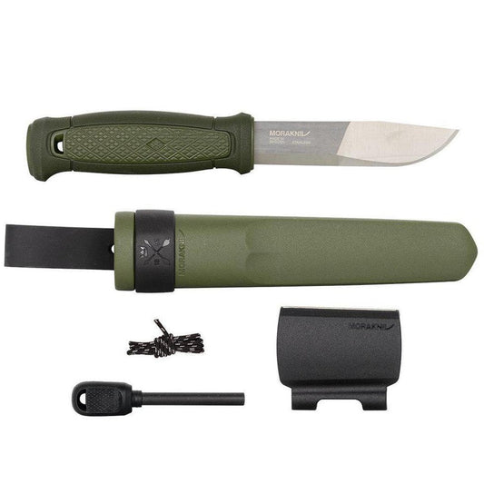 A top-down view of the Morakniv Kansbol Survival knife in Green with its sheath, fire starter, and lanyard displayed against a white background.