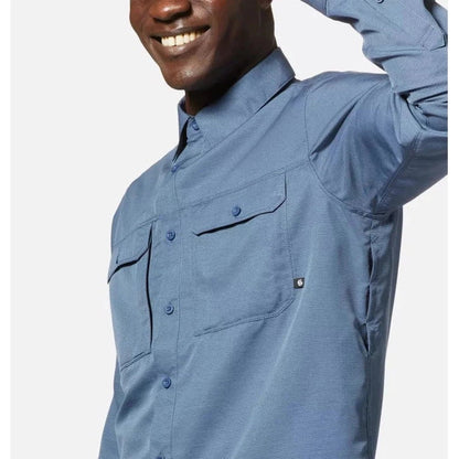 A front view of the Mountain Hardwear Men's Canyon Long Sleeve Shirt in Zinc showing chest pockets and a model wearing it against a white background.