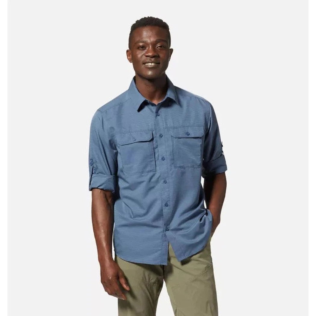 A front view of the Mountain Hardwear Men's Canyon Long Sleeve Shirt in Zinc, showing the model wearing it with khaki pants against a plain white background.