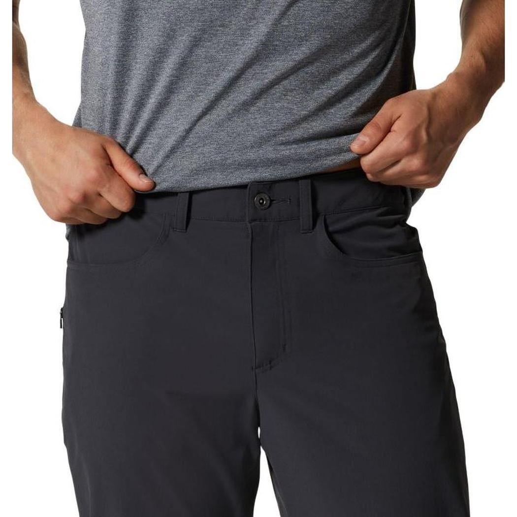 A front view of the Mountain Hardwear Men's Yumalino Lined Pant in Dark Storm showing the front pocket and button closure against a white background.