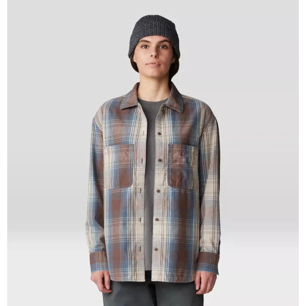 A front view of the Mountain Hardwear Women's Dolores Flannel Long Sleeve Shirt in Choss St on a model wearing a beanie against a light background.