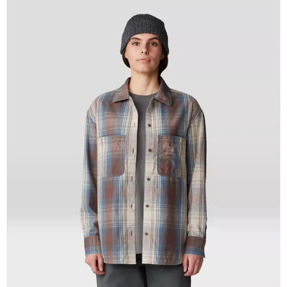 A front view of the Mountain Hardwear Women's Dolores Flannel Long Sleeve Shirt in Choss St on a model wearing a beanie against a light background.