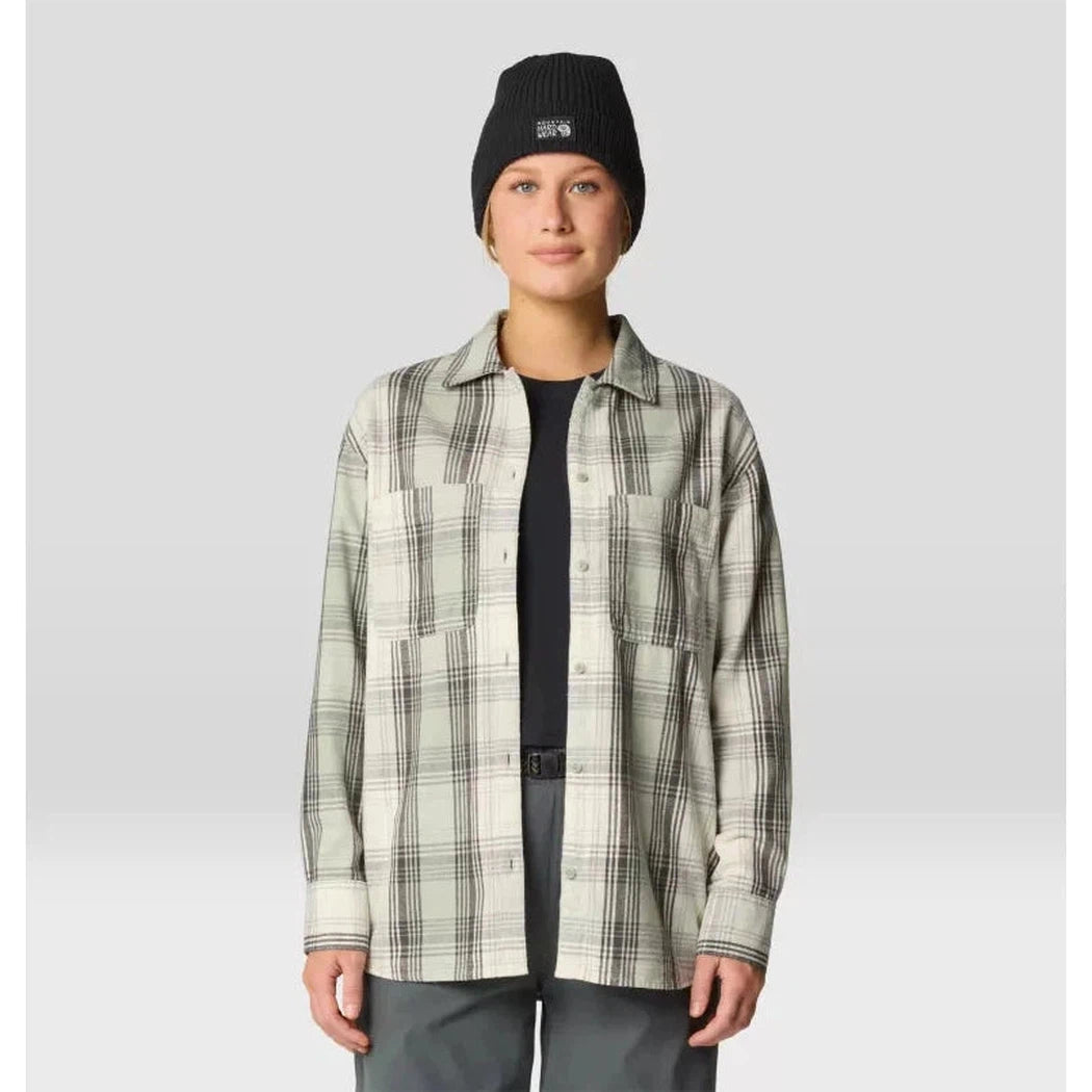 A front view of the Mountain Hardwear Women's Dolores Flannel Long Sleeve Shirt in Choss St on a model wearing a black beanie against a light gray background.