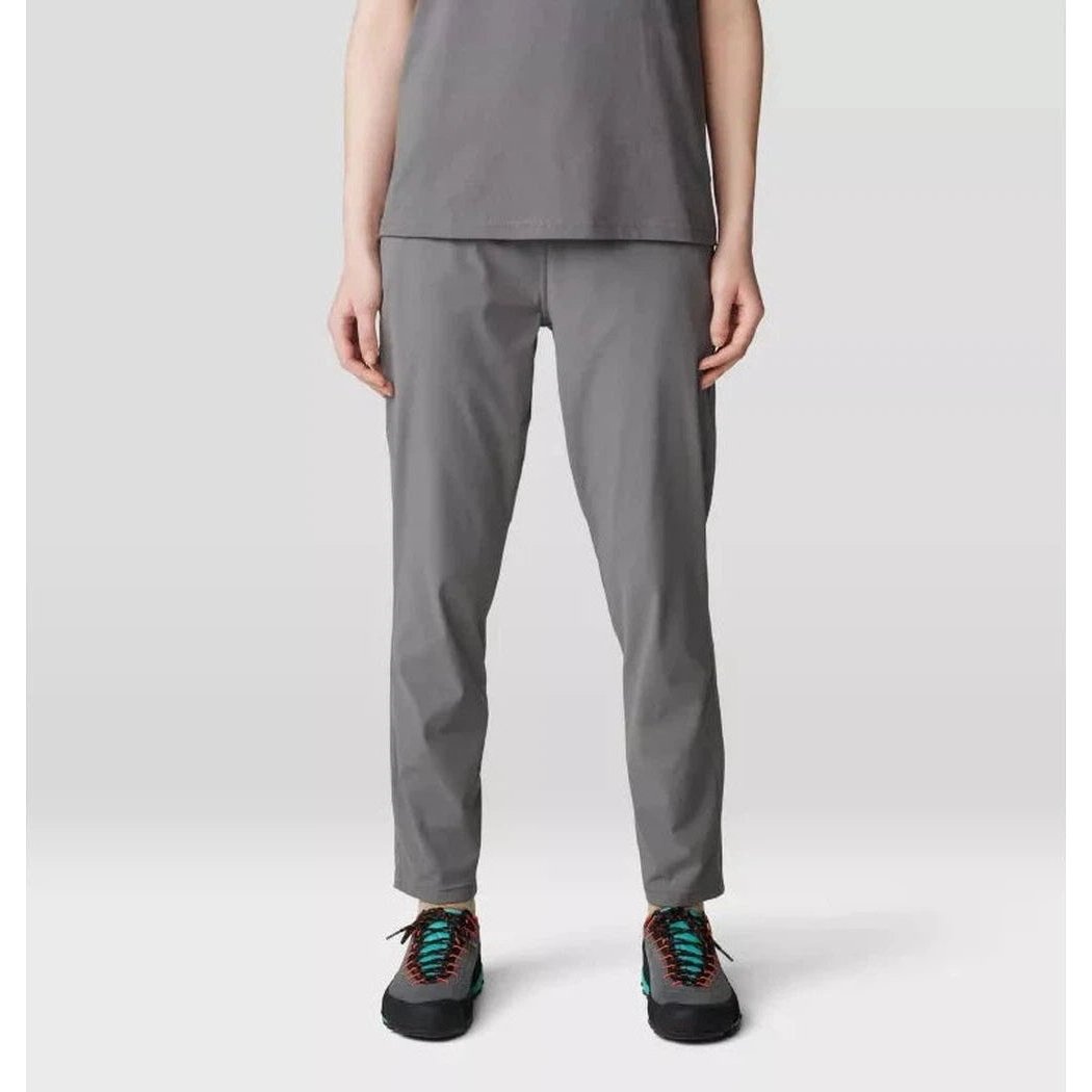 A front view of the Mountain Hardwear Women's Dynama Ankle Pant in Black, showing the model wearing it against a plain white background.