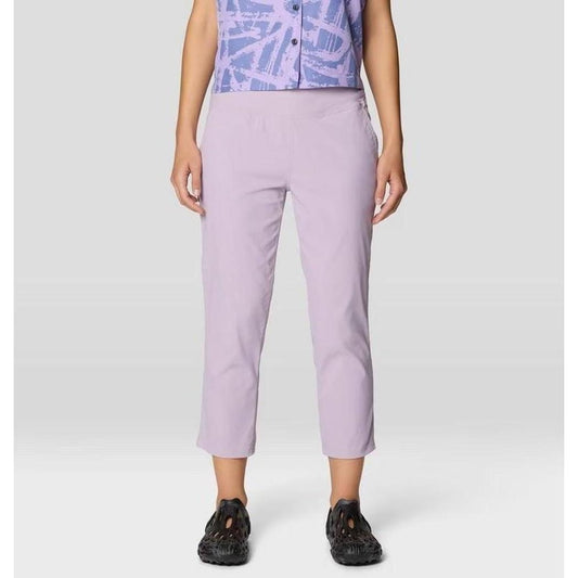A front view of the Mountain Hardwear Women's Dynama Crop in Atmospheric color on a model wearing black shoes against a plain background.