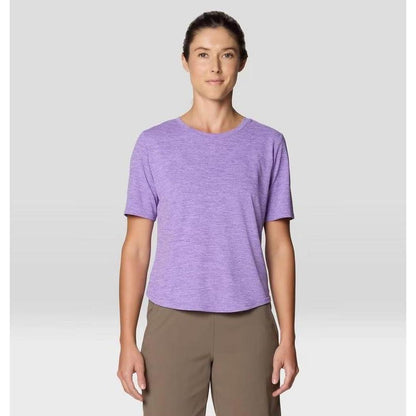 A front view of the Mountain Hardwear Women's Sunblocker Short Sleeve in Harbor Violet on a model against a light gray background.