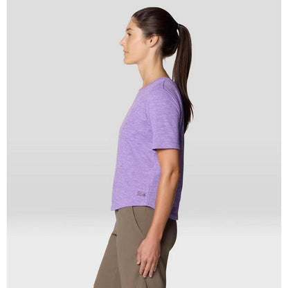 Side view of the Mountain Hardwear Women's Sunblocker Short Sleeve in Harbor Violet on a model against a light background.