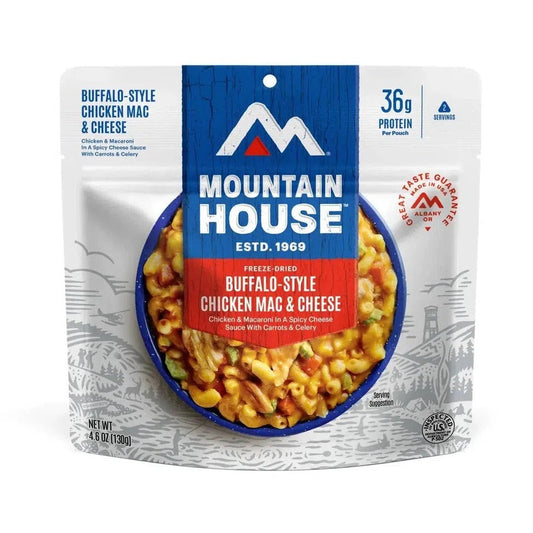 A front view of the Mountain House Buffalo Style Chicken Mac and Cheese showing the freeze-dried meal in a blue bowl with a white background.