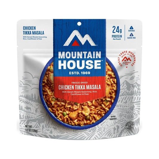 A front view of the Mountain House Chicken Tikka Masala backpacking food package showing the freeze-dried meal inside.