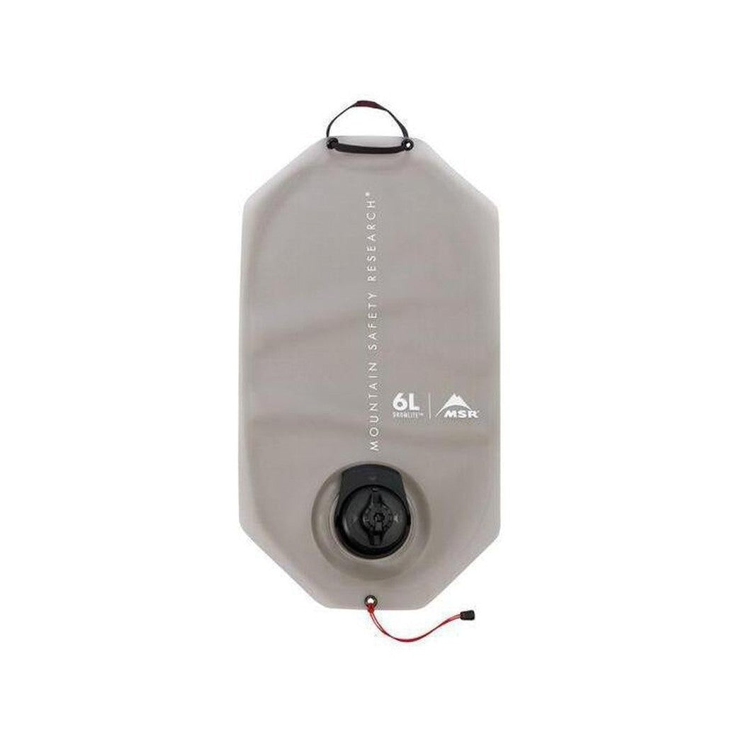 A front view of the MSR DromLite 2L hydration bag in charcoal/graphite with a black cap and red cord against a white background.