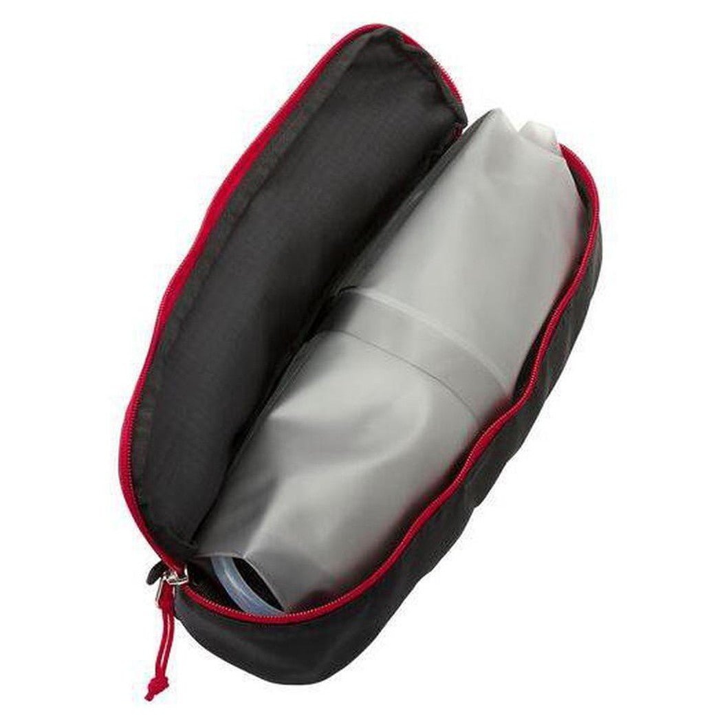 A black and red MSR Guardian Gravity Purifier bag open to show the gray purifier inside against a white background.