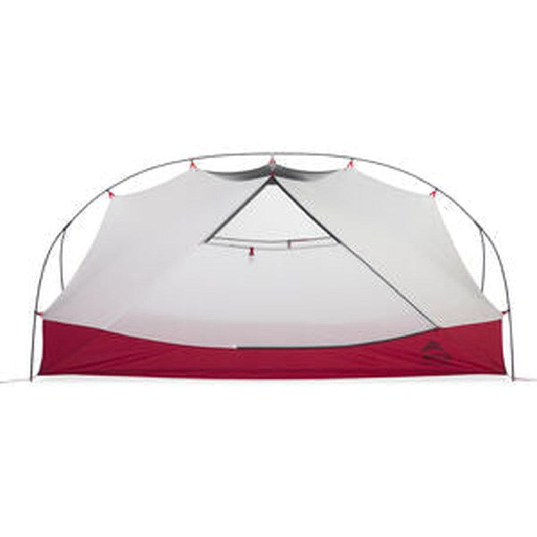 The MSR Hubba Hubba 2 Tent V9 is shown from a front angle with a white background, featuring its red and gray color scheme and mesh entrance.