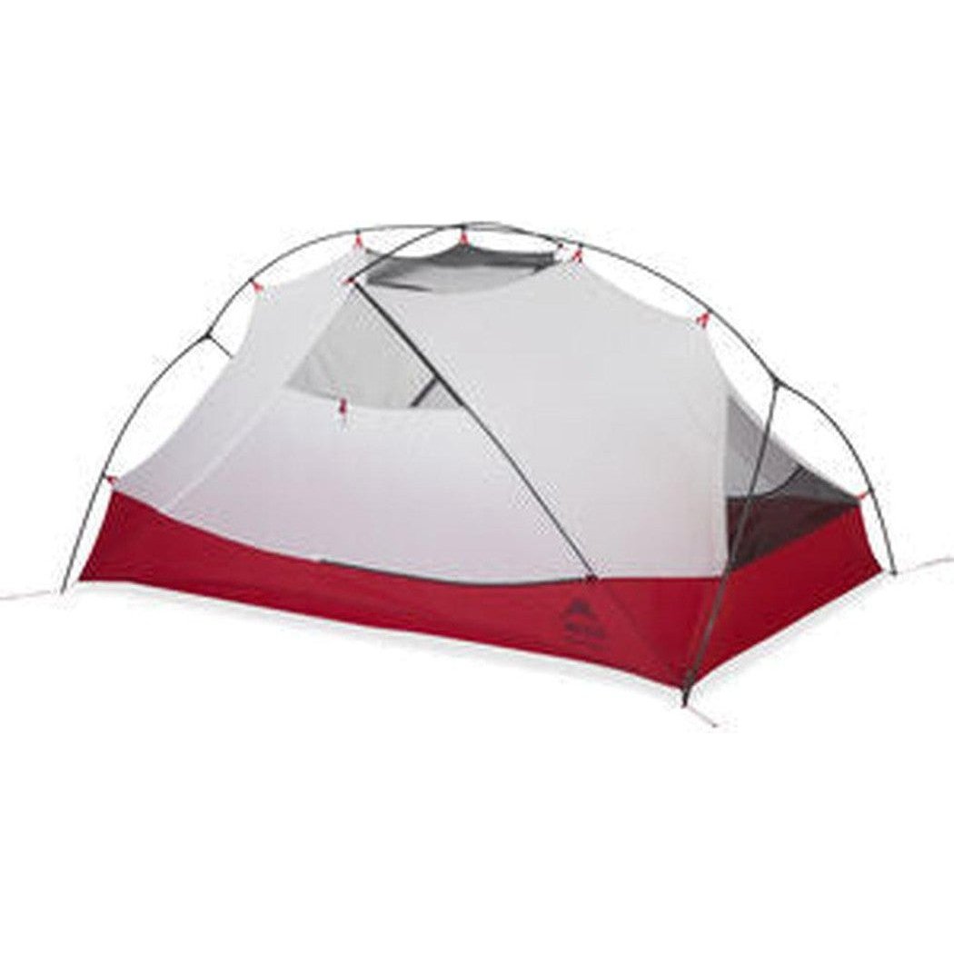 The MSR Hubba Hubba 2 Tent V9 is shown from a front angle with its red and gray fabric, set against a plain white background.