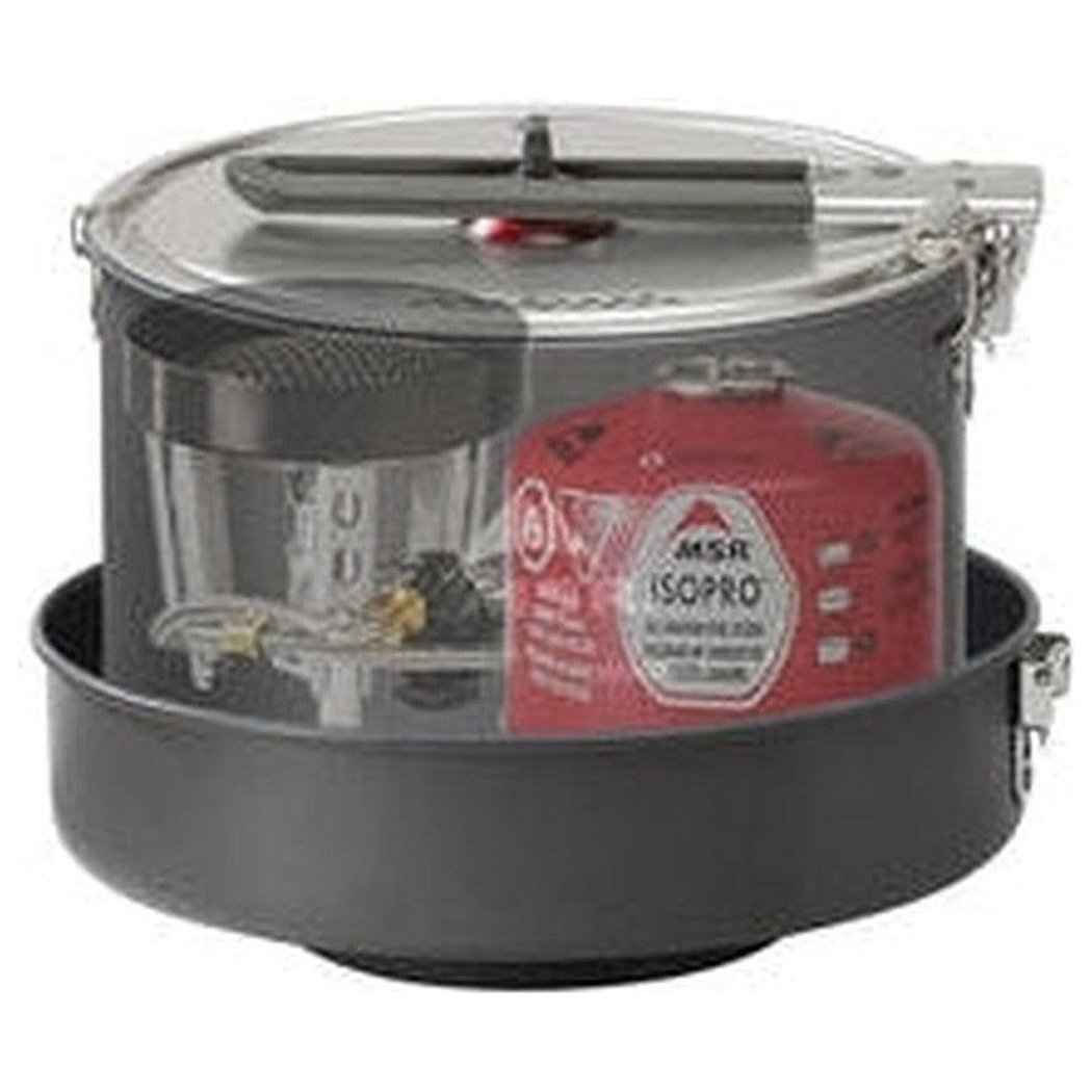 A top-down view of the MSR WindBurner Combo System in Charcoal/Graphite showing the red MSR IsoPro fuel canister and transparent pot inside the black cooking base.